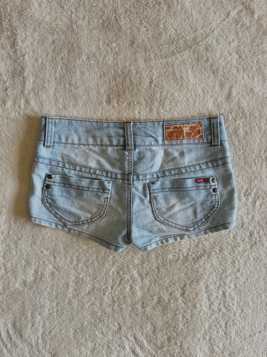 y2k vintage low waisted light was denim micro mini shorts with buckles