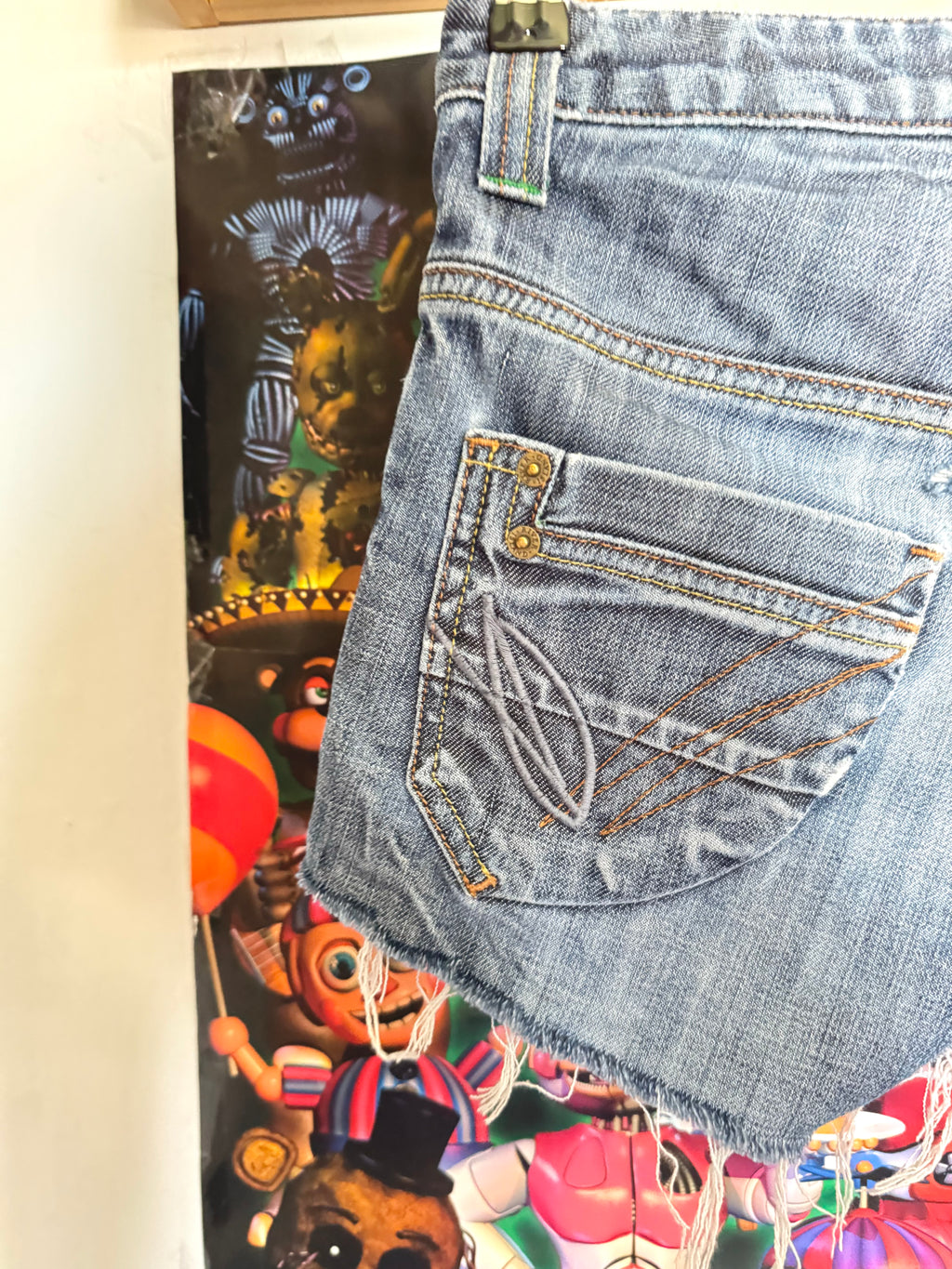 y2k vintage low waisted distressed dark wash denim mini shorts