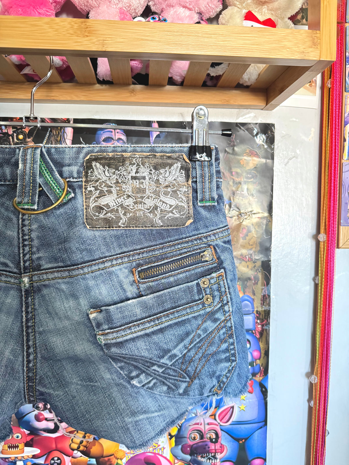 y2k vintage low waisted distressed dark wash denim mini shorts
