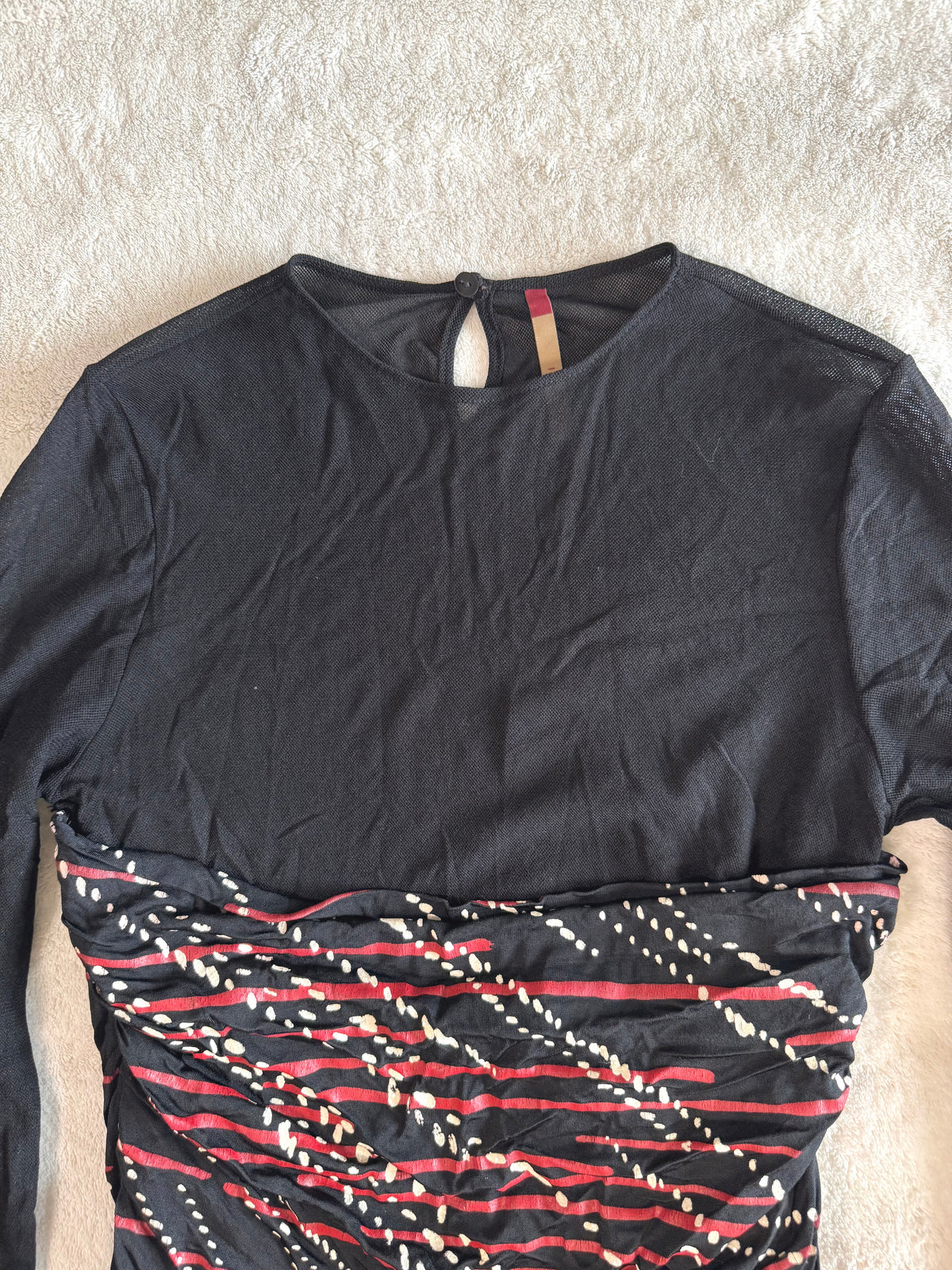 y2k vintage fitted ruched mesh long sleeved top with red slinky swirl pattern body