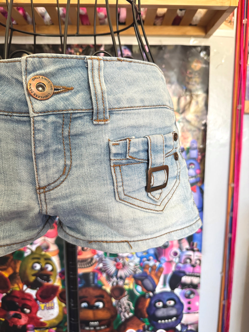 y2k vintage low waisted light was denim micro mini shorts with buckles