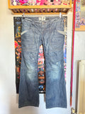 y2k vintage low waisted dark wash denim slouchy boyfriend jeans