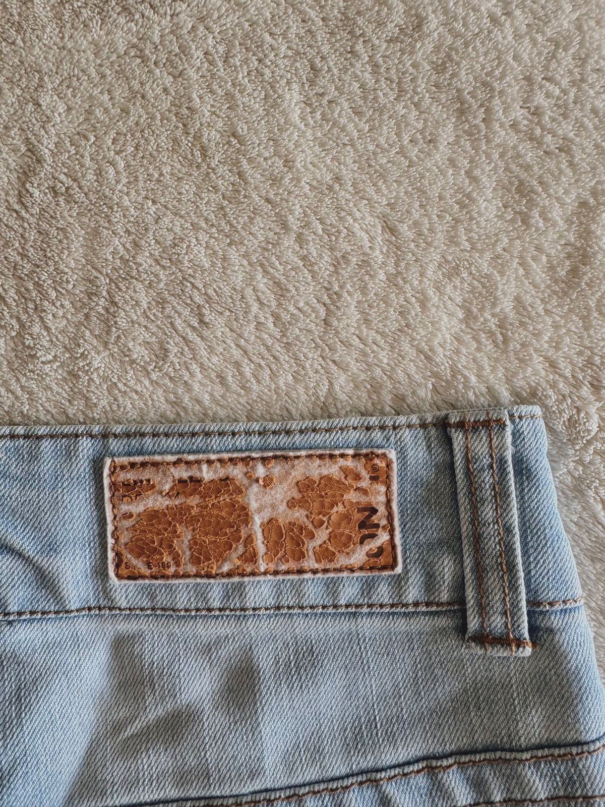 y2k vintage low waisted light was denim micro mini shorts with buckles