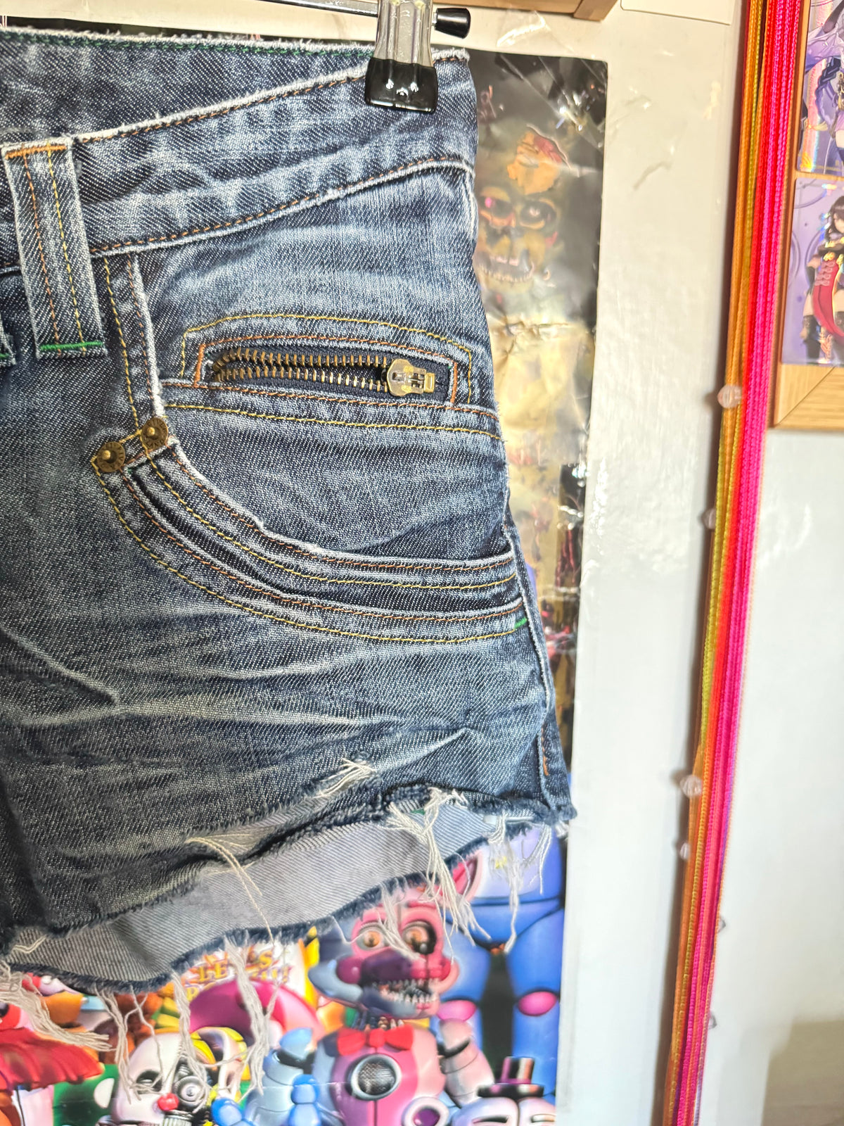 y2k vintage low waisted distressed dark wash denim mini shorts