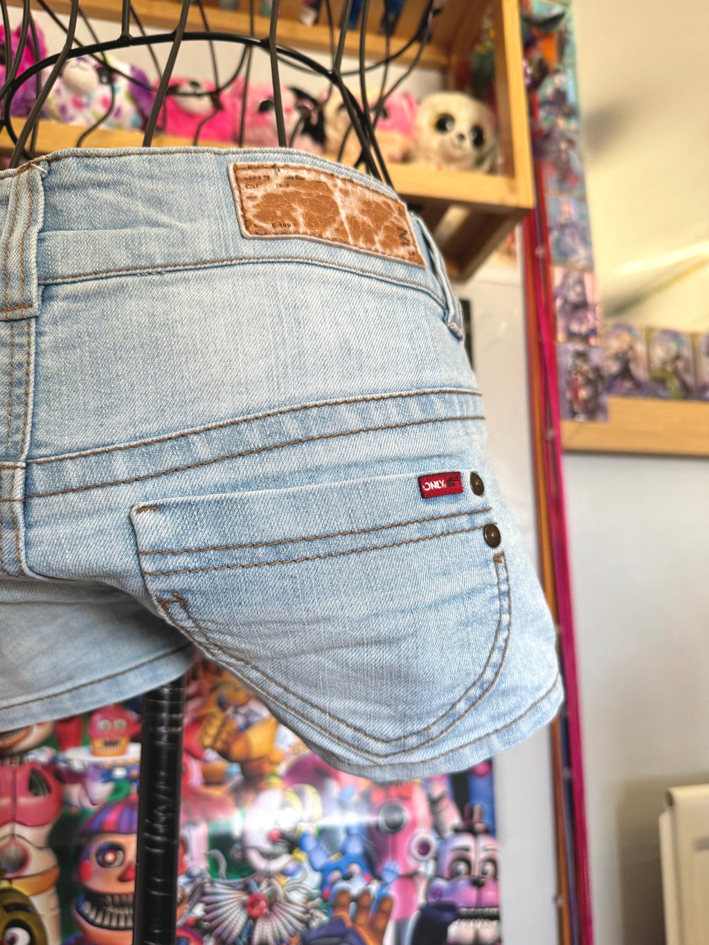 y2k vintage low waisted light was denim micro mini shorts with buckles