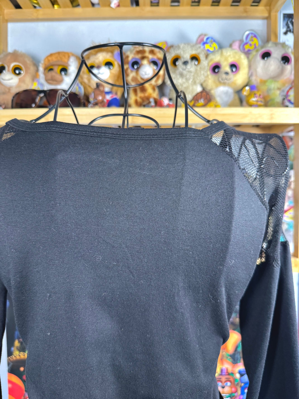 y2k vintage graphic skull print long sleeved top with sheer panels and grommet tassels emo
