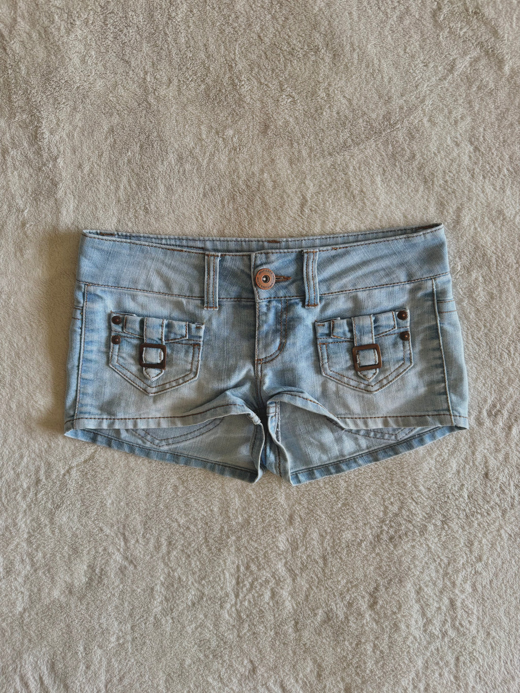 y2k vintage low waisted light was denim micro mini shorts with buckles