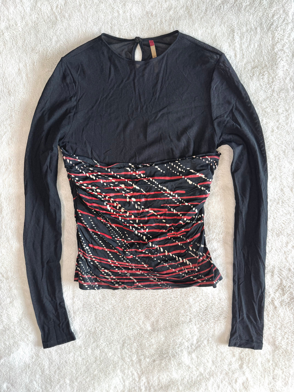 y2k vintage fitted ruched mesh long sleeved top with red slinky swirl pattern body