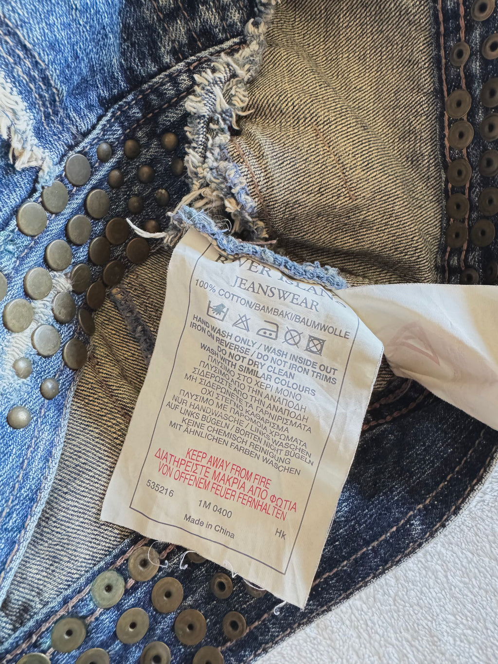 y2k vintage medium wash denim sleeveless waistcoat with studs and punk details