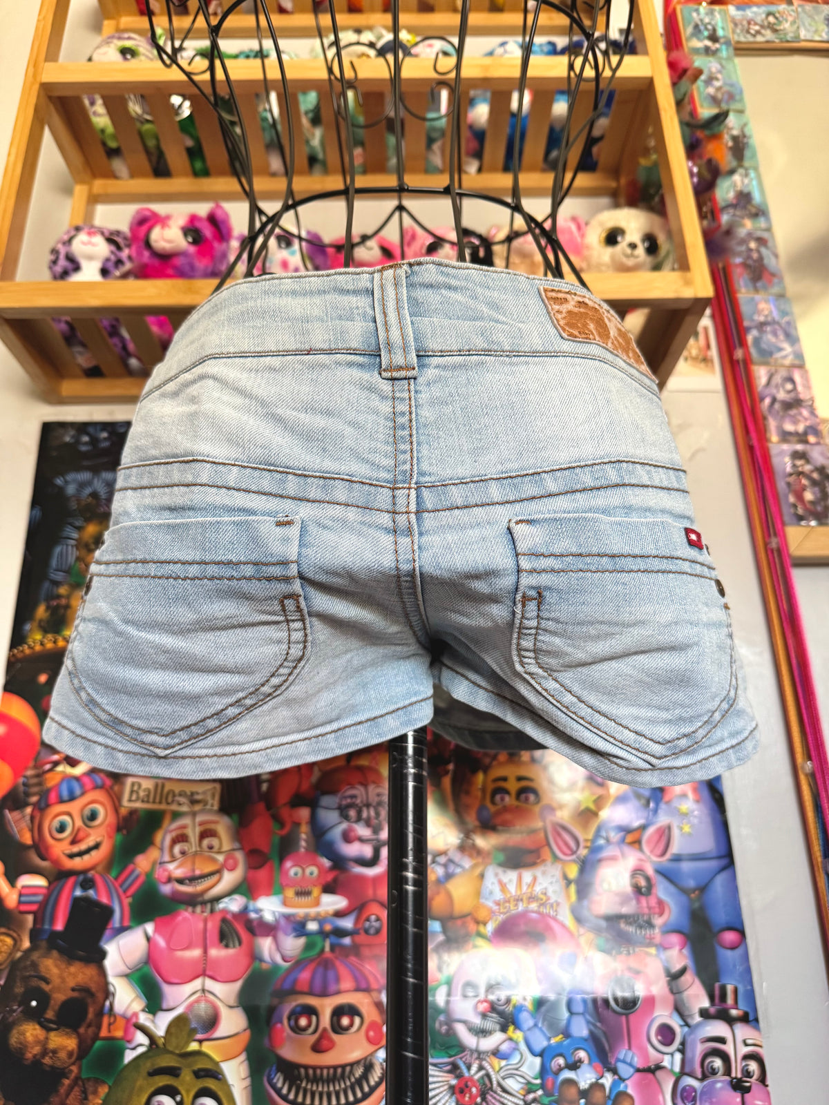 y2k vintage low waisted light was denim micro mini shorts with buckles