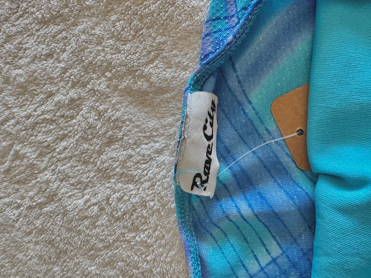 y2k vintage aqua blue fitted halterneck tie back top with glittery shimmer throughout