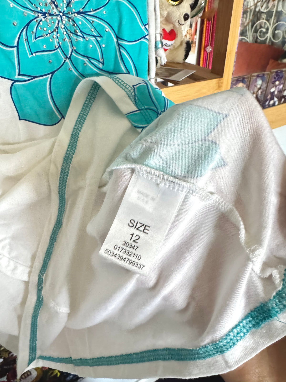 y2k vintage turquoise floral print fitted cami top with ruched detail, rhinestones and sleeve tassels