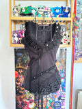 y2k vintage fitted sleeveless black vest top with lace trimmings and sequin embellishments
