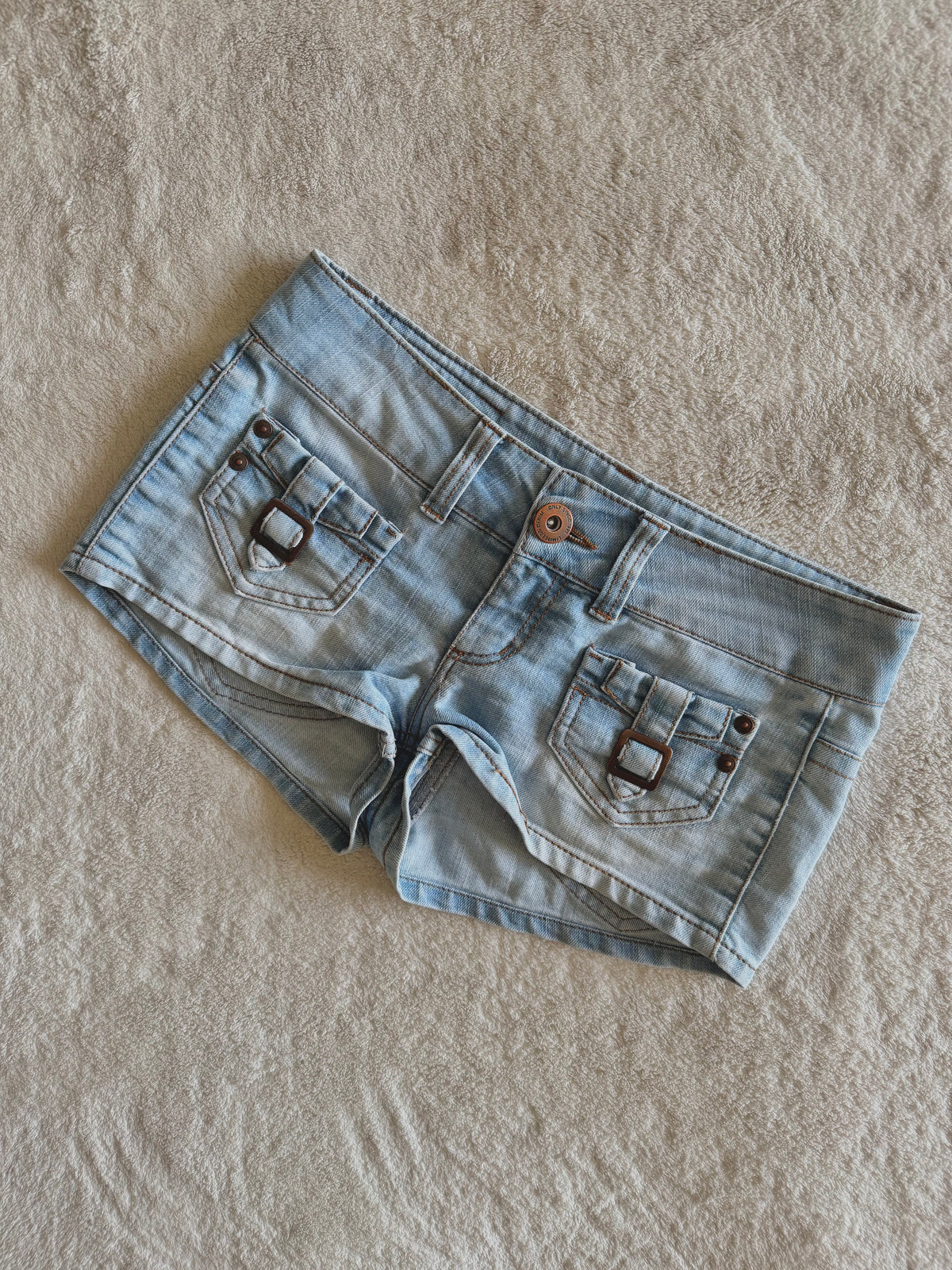 y2k vintage low waisted light was denim micro mini shorts with buckles